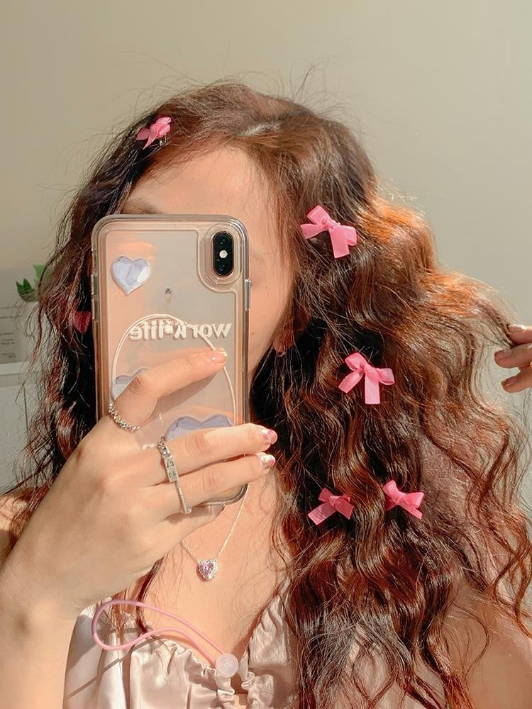 8 Pink Ribbon Bow Hair Clips On The Forehead